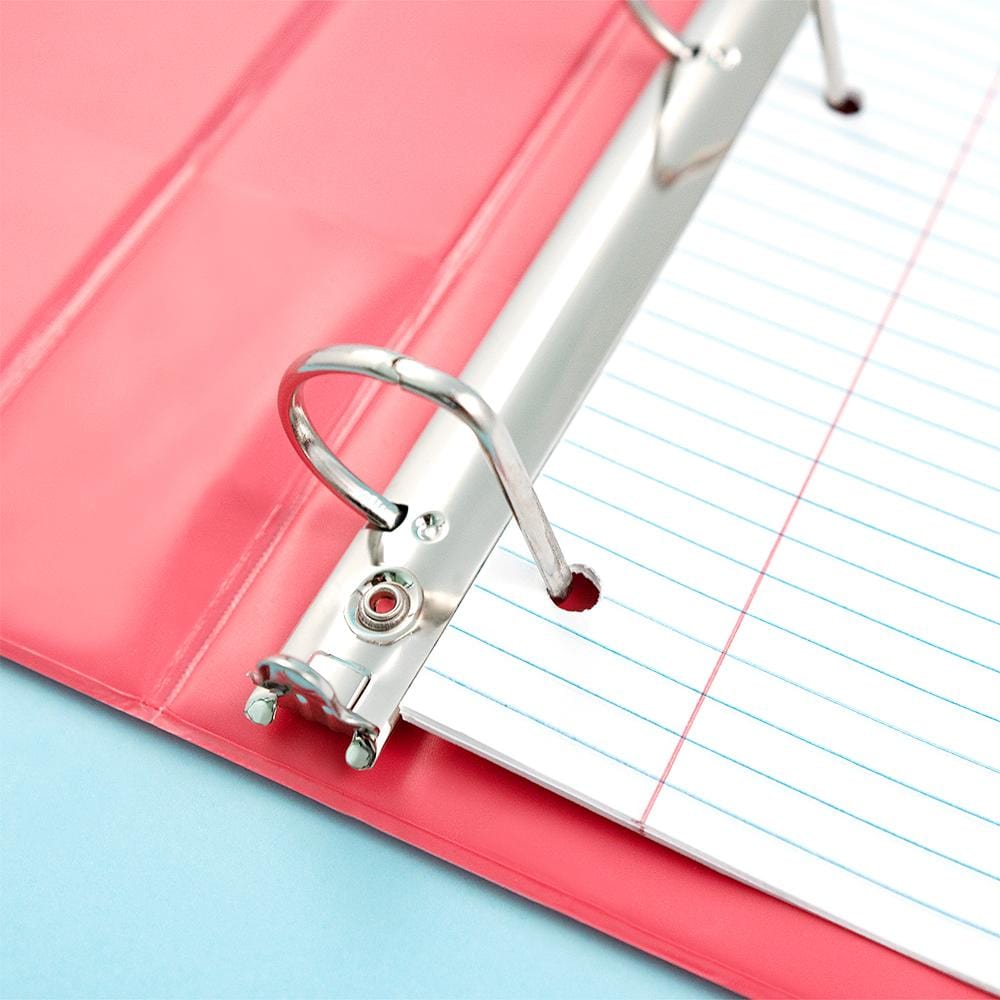 inside of open 3-ring binder showing D-ring detail inside binder