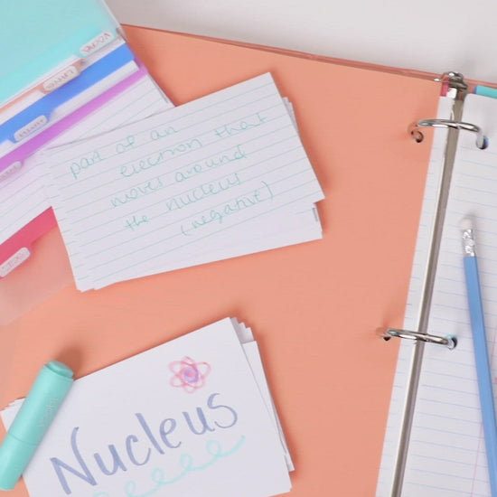 video of binder shown with spiral notebooks set, journal set, dividers, index card set, highlighters, pencils in coordinating colors